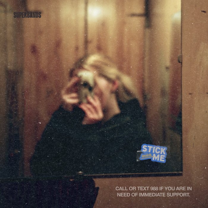 Stick With Me campaign post with a sticker on a mirror